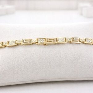 14k gold bracelet Greek Design with clear pave' stones